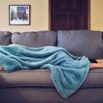 Person Sleeping on Couch